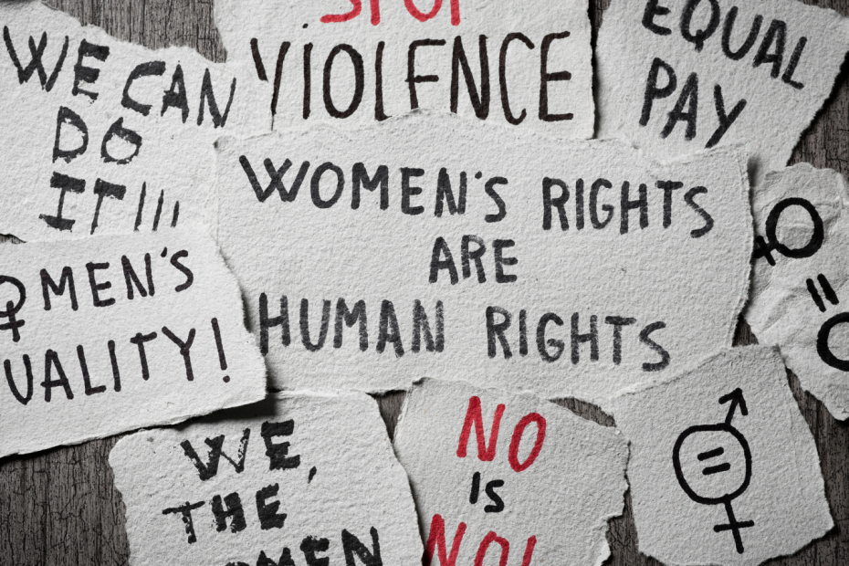 Pieces of paper with concepts related to women's rights written in them